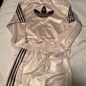 Adidas tracksuit new with tags. Jacket is small and bottom is extra small.